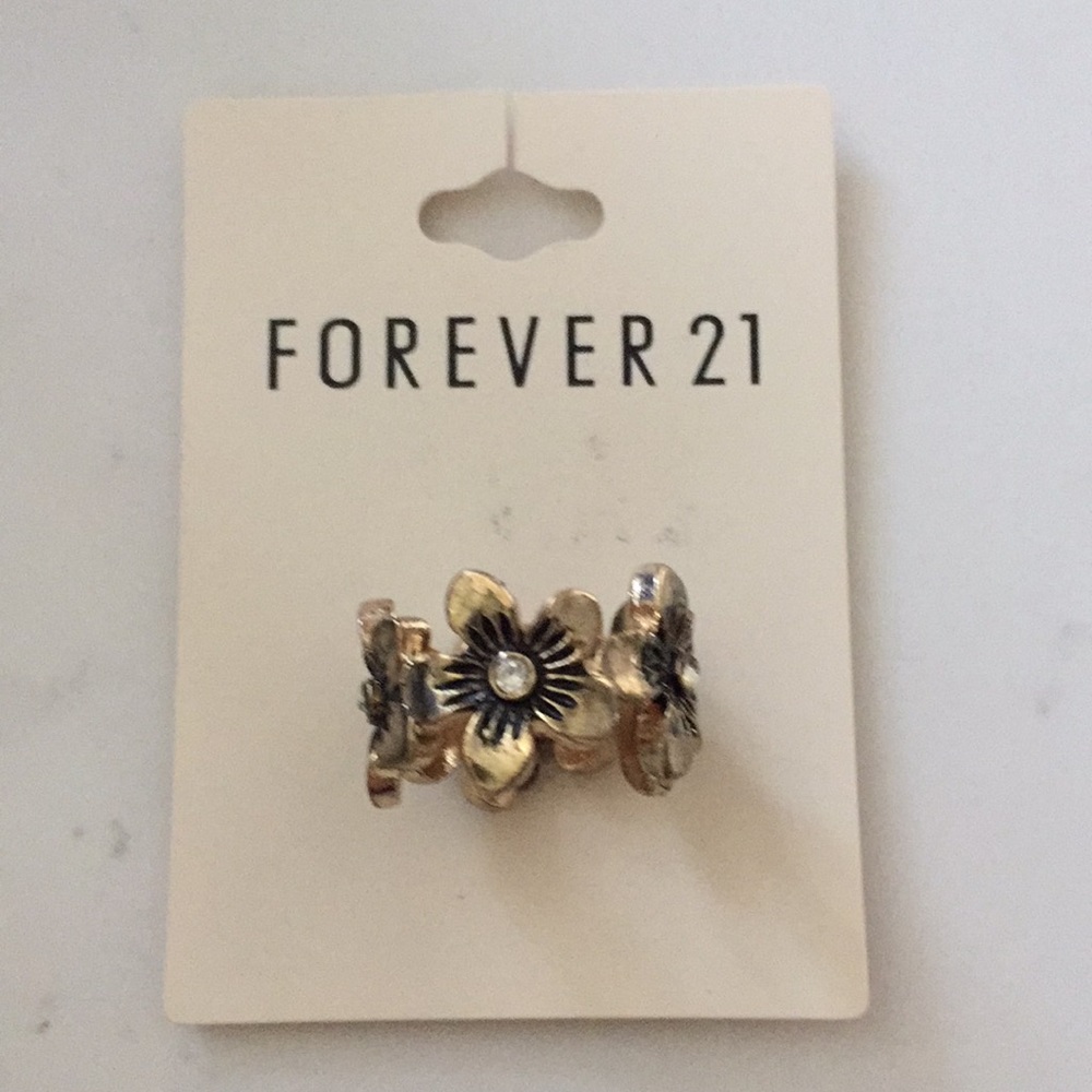 FREE WITH PURCHASE or 3/$20. Hawaiian flower ring - add on 5.00